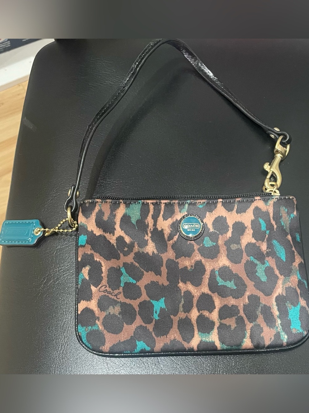 Rare Coach Ocelot Print Wristlet with Pops of Gorgeous Teal! EUC